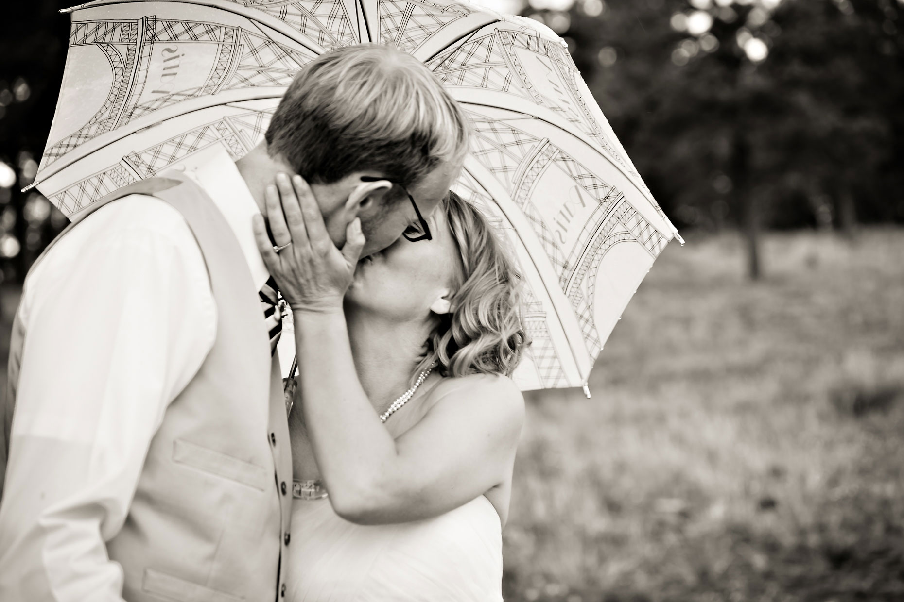 Bride & groom kiss for wedding photographer in Yosemite.