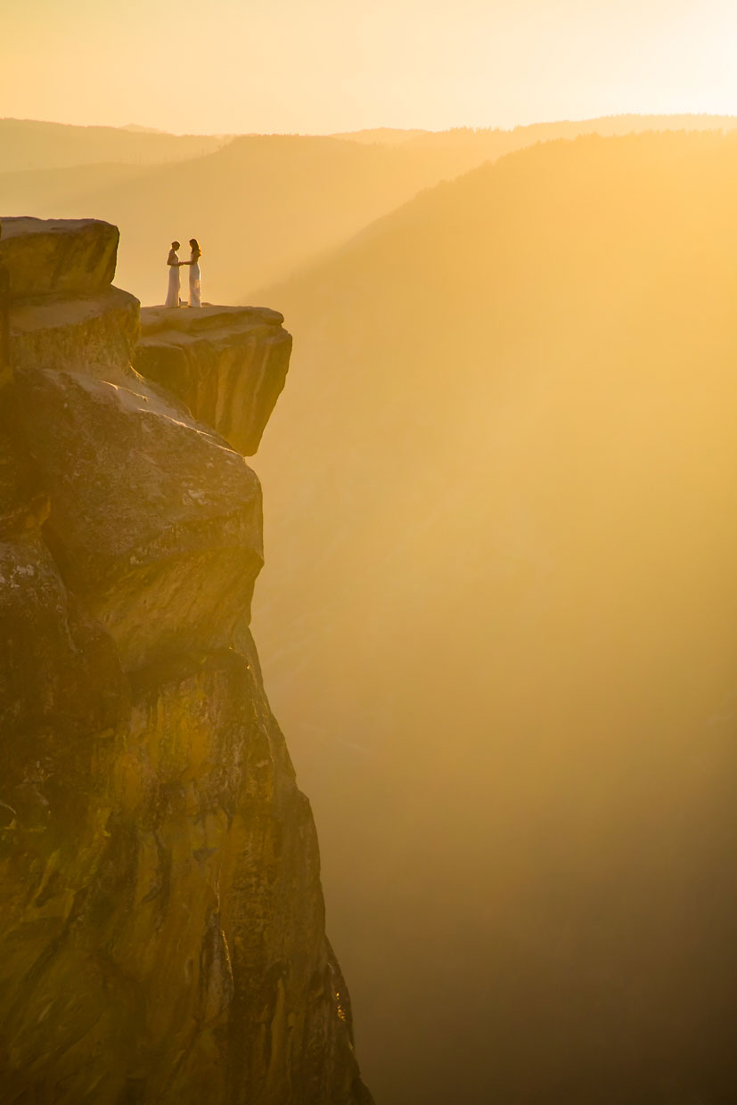 Lesbian wedding photographer at Taft Point in Yosemite.