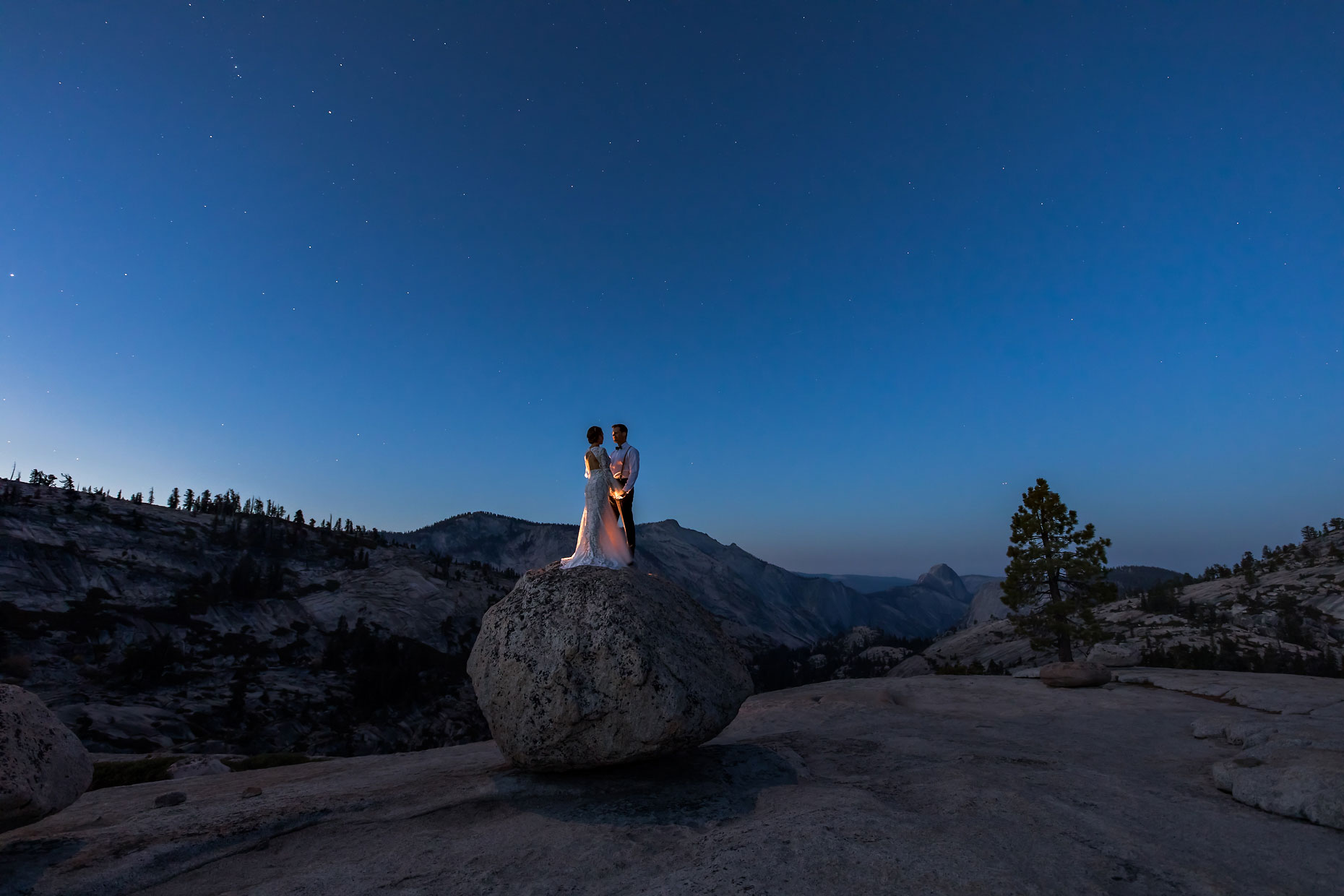 Wedding photography with stars and moon in Yosemite.