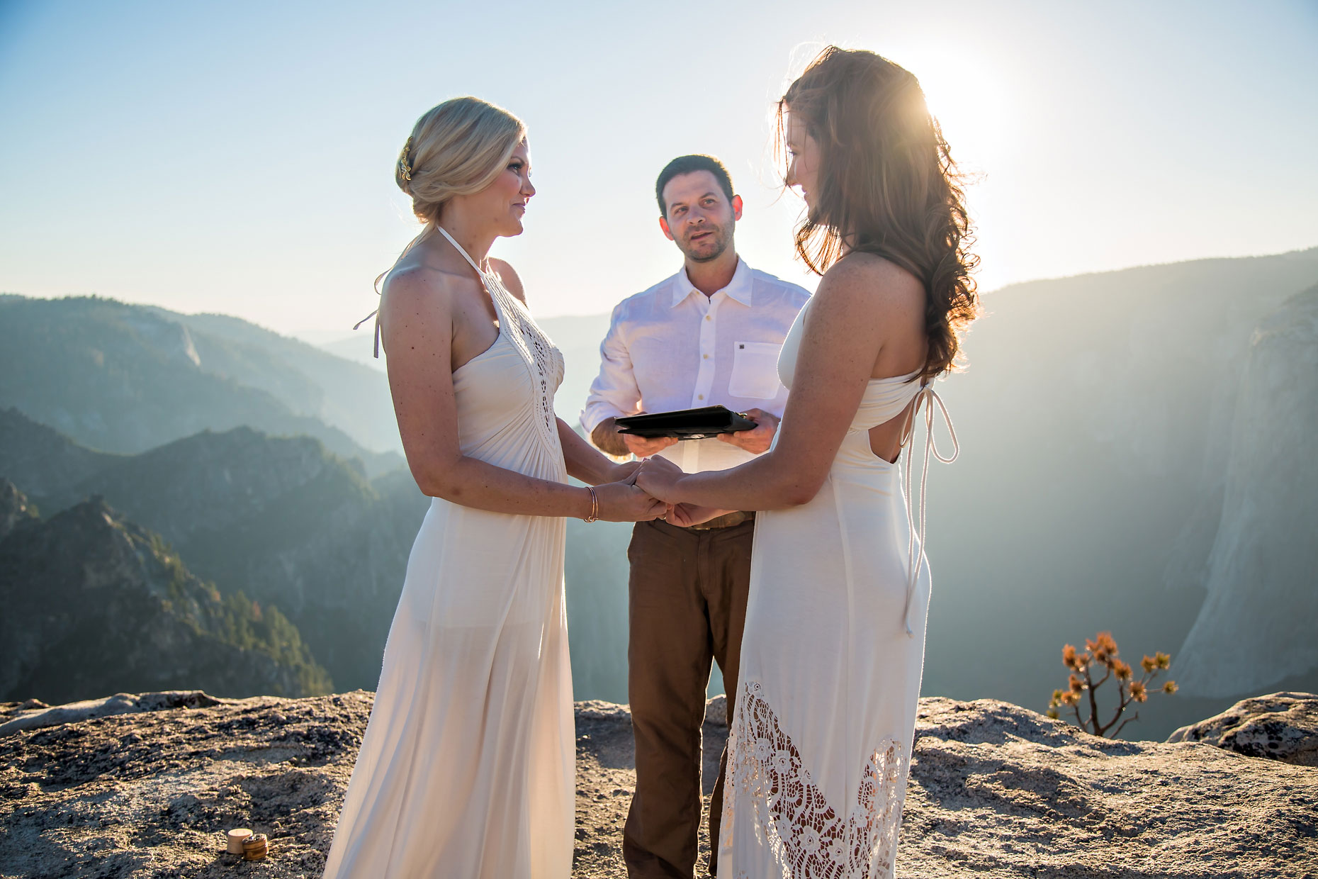 Lesbian wedding photographer at Taft Point in Yosemite.