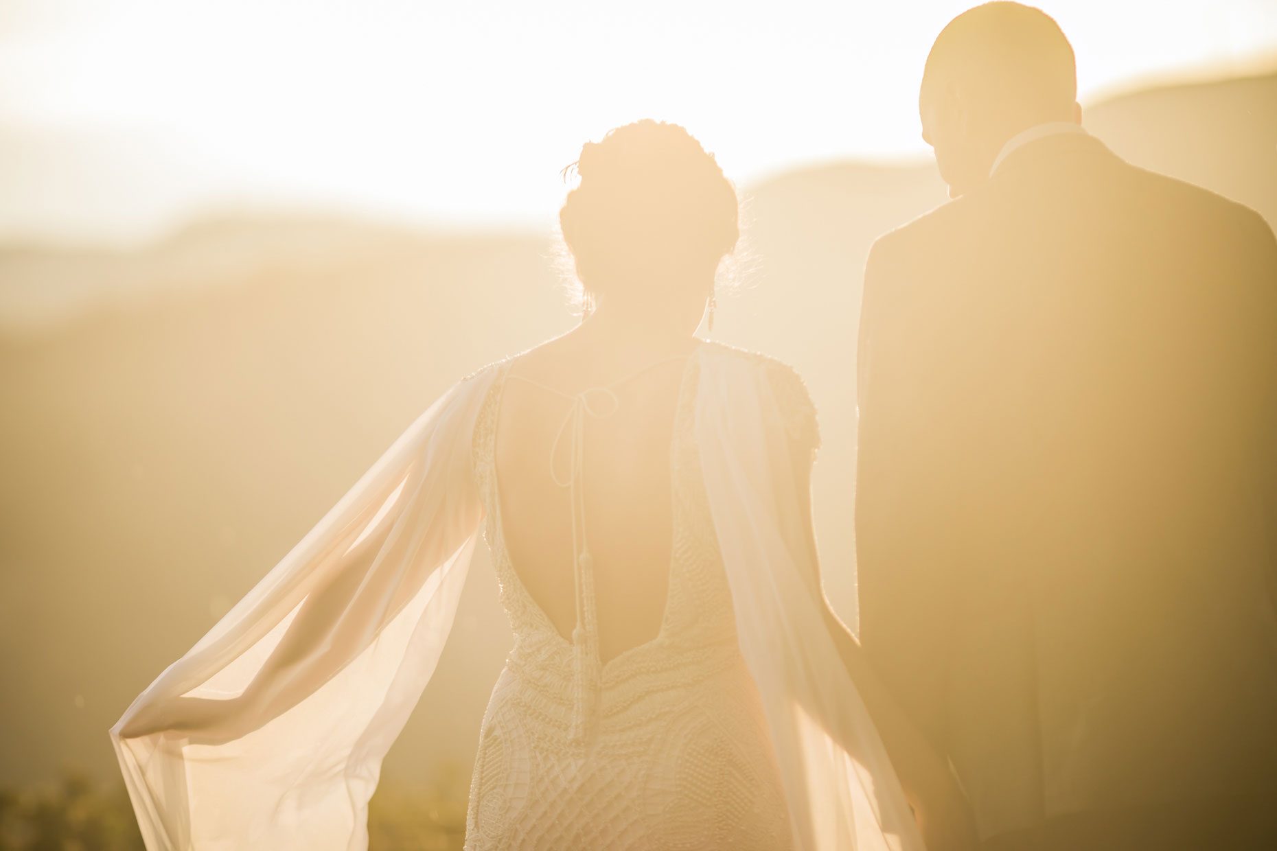 Wedding couple in golden light.